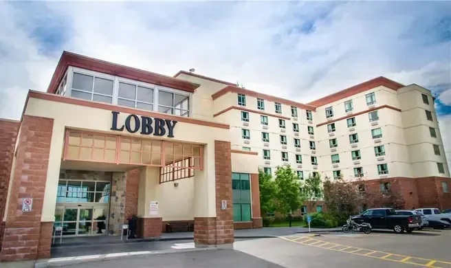 Exterior view of a hospitality property at dusk